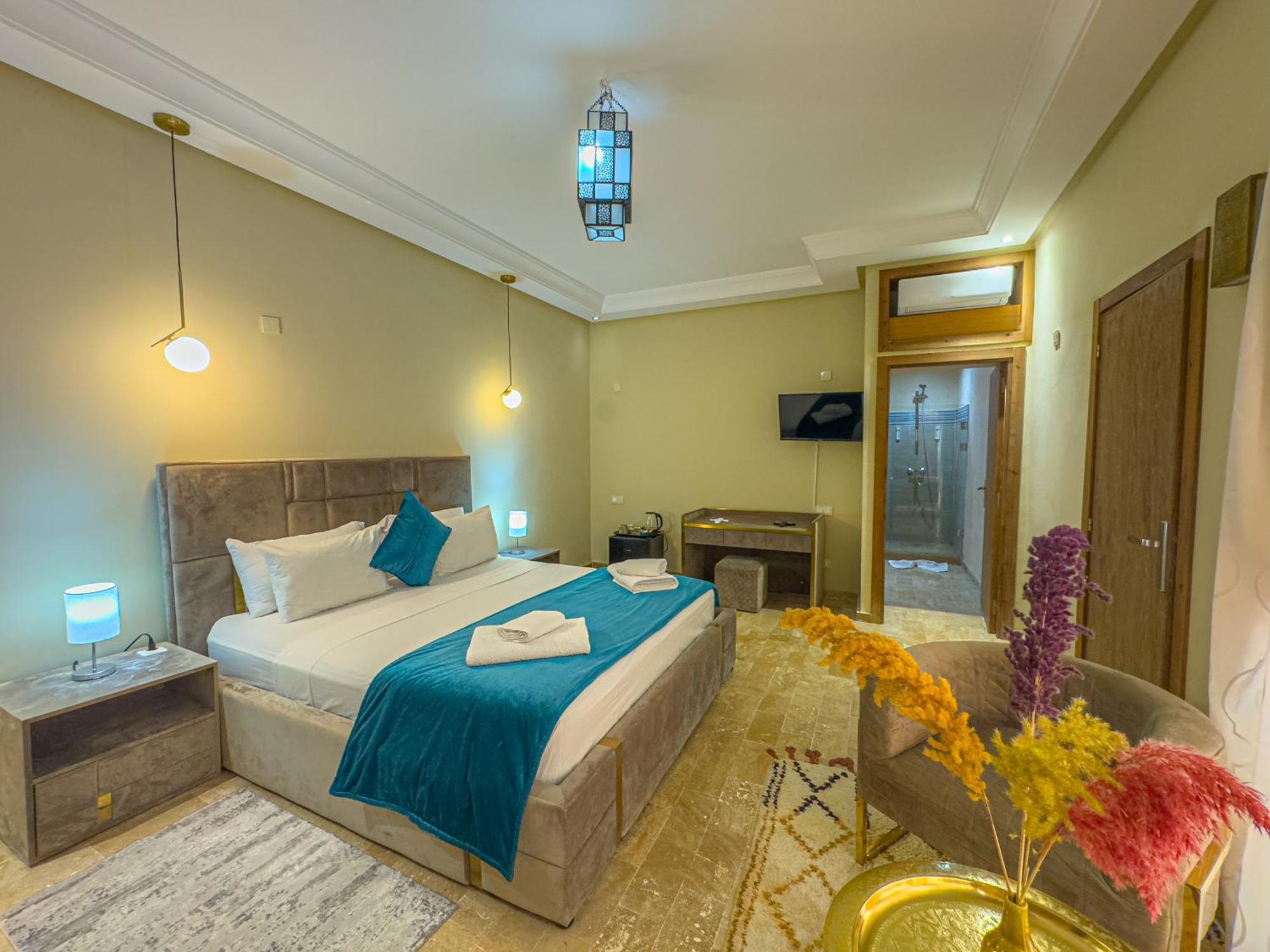 Riad Azia *